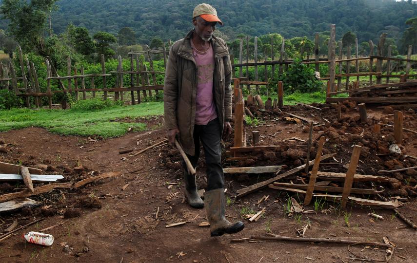 Jackson Ngusilo, a member of the Ogiek community, walks where his house was demolished at Sasimwani village within the Mau Forest complex.