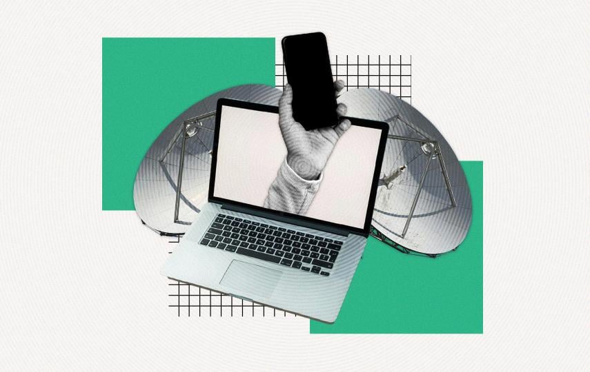This is a composite image done in the style of editorial collage. At the centre is a laptop. Out of its screen we see a hand holding a phone. Behind these two things are two satellite dishes. Two green squares and two grids are in the background.